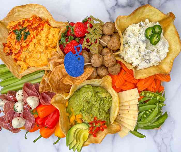 A Football party food board made with Azteca salad shells.